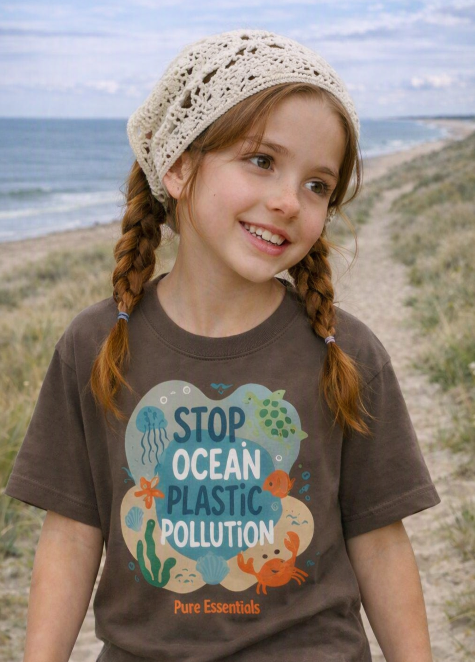 A young girl with braided hair and a crochet beanie stands outdoors on a beach path wearing a brown graphic T-shirt that reads 'STOP OCEAN PLASTIC POLLUTION' with ocean-themed illustrations. A small 'Made with AI' label appears in the top right corner.